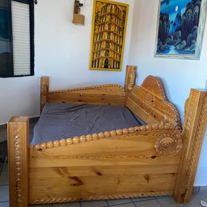 Hand carved bed
