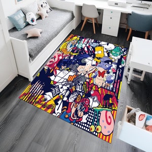 May include: A rectangular area rug featuring a vibrant collage of cartoon characters and comic book art. The rug's design incorporates bold colors, including red, yellow, blue, and white, creating a visually dynamic and playful aesthetic. The rug is placed on a gray wooden floor.