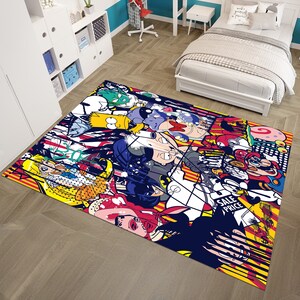 May include: A rectangular area rug featuring a vibrant pop art design with cartoon characters in a collage. The rug has a navy blue border and a mix of red, yellow, white, and black colors. The rug has the words "SALE PRICE" in a white box.