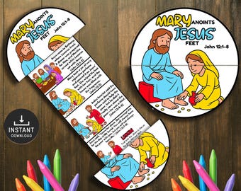 May include: A colorful, illustrated puzzle with the text "MARY ANOINTS JESUS FEET John 12:1-8". The puzzle depicts scenes from the Bible, with figures in robes and text excerpts. A download icon is visible.