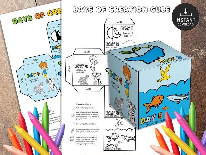 May include: A printable, colorable, and foldable paper cube craft for kids. The cube features illustrations of the six days of creation, with text labels for each day. The cube is designed to be assembled and used as a learning tool for children.