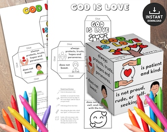 May include: A printable, black and white, paper craft cube with the words "God is Love" on one side. The cube is designed to be folded and glued together. The other sides of the cube have different phrases about love, such as "always protects, trusts, hopes and perseveres" and "is patient and kind".