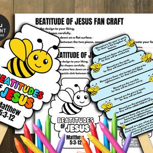 May include: A craft kit for making "Beatitudes of Jesus" fans. The kit includes printable templates with bee illustrations and Bible verses from Matthew 5:3-12. Colored pencils are arranged around the fans, ready for use. The words "Instant Download" are also visible.