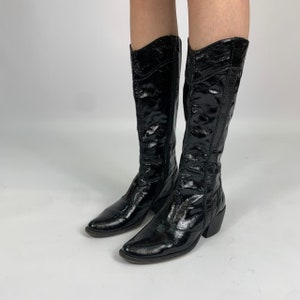 Glossy black boots shop