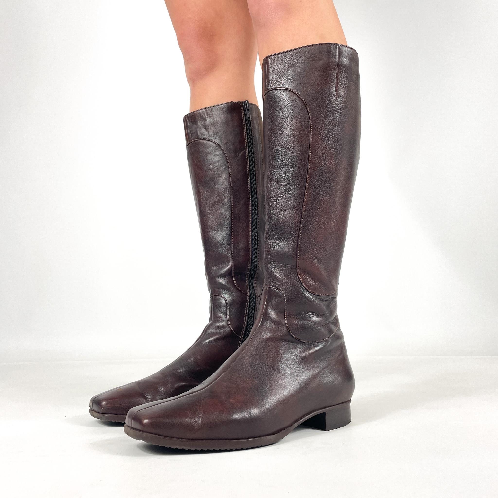 Purple knee high boots España