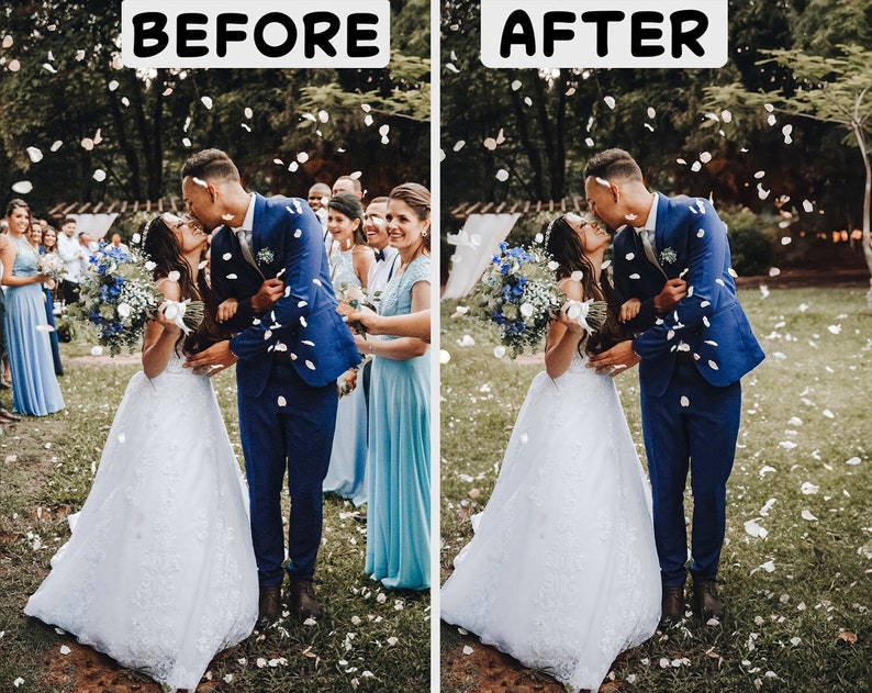 May include: A bride and groom kiss as they are showered with white flower petals. The bride is wearing a white wedding dress and the groom is wearing a blue suit. The couple is surrounded by guests in the background.