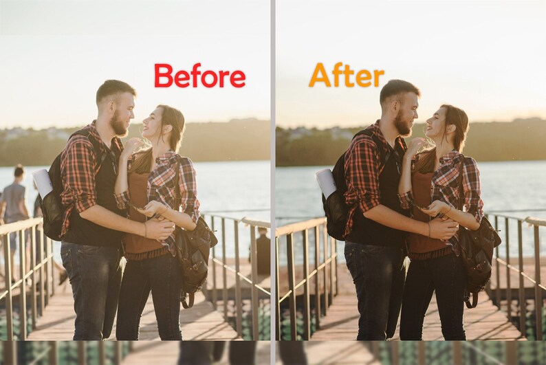 May include: A couple in plaid shirts stand on a wooden dock, smiling at each other. They are holding each other and have backpacks on. The dock is over a body of water with a green shore in the background. The sky is a light orange color.