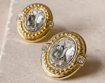 Pendientes llamativos de oro y cristal transparente de Osca del la Renta