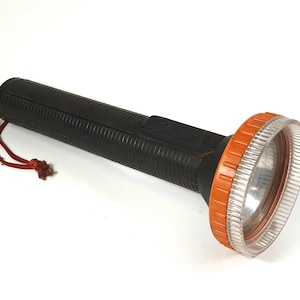Lampe de poche ARTAS des années 1970, torche en caoutchouc vintage, éclairage de secours pour camping, batterie électrique, Allemagne, DDR est, lampe rétro orange et noir, étanche