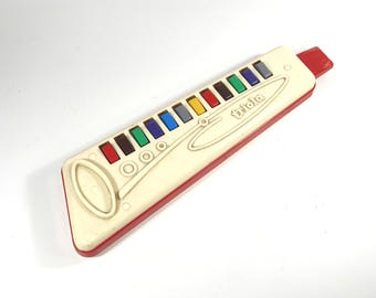 Armónica de viento TRIOLA vintage, juguete musical para niños, Alemania Oriental, RDA, GDR, C.A. Seydel Söhne, flauta de plástico colorida, flauta dulce.