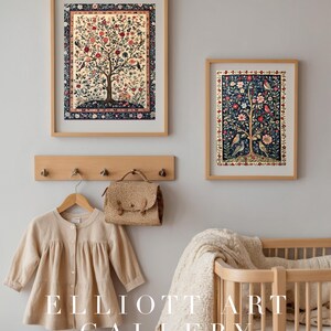 May include: Two framed art prints with tree and bird designs hang on a wall. A beige cardigan and a small purse hang on a wooden rack below. A crib with a white blanket is on the right. The text "ELLIOTT ART GALLERY" is at the bottom.