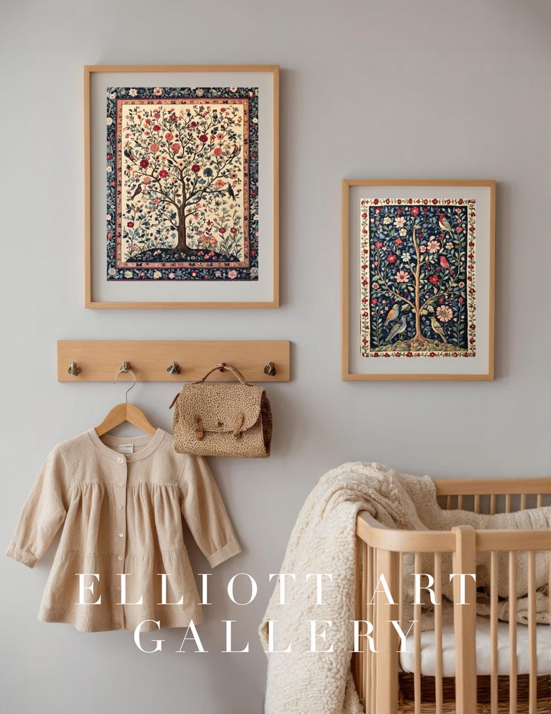 May include: Two framed art prints with tree and bird designs hang on a wall. A beige cardigan and a small purse hang on a wooden rack below. A crib with a white blanket is on the right. The text "ELLIOTT ART GALLERY" is at the bottom.