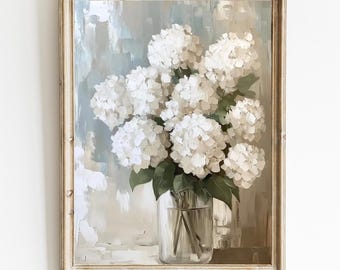 May include: A framed painting of a bouquet of white hydrangeas in a clear glass vase. The background is a soft blue and white abstract design.