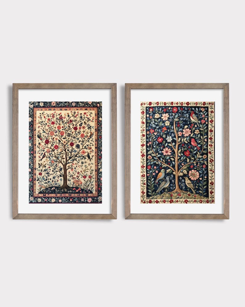 May include: Two framed art prints featuring detailed tree and bird designs. One print has a cream background with a tree adorned with red and pink flowers. The other print has a dark blue background with a similar tree and floral pattern.