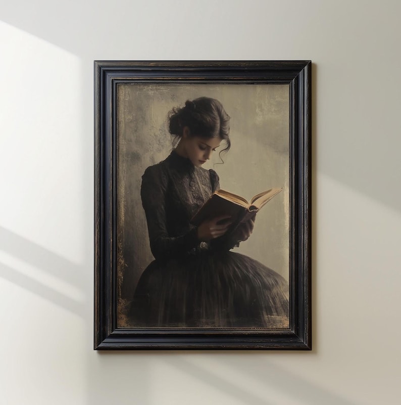 May include: A woman in a black dress sits and reads a book. The image has a vintage, faded look.