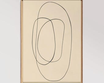 May include: A framed abstract art print with a beige background and black line drawings of overlapping ovals.