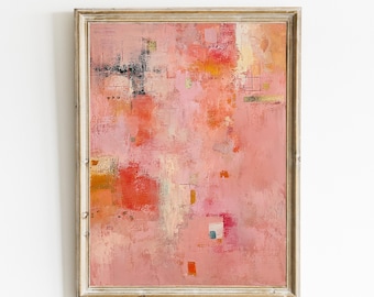 May include: Abstract painting in a light wooden frame. The artwork features a blend of pink, red, orange, and gold hues, with textured brushstrokes creating a layered effect. Small black and white geometric shapes are scattered throughout the composition.