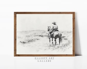 Puede incluir: Dibujo a lápiz en blanco y negro enmarcado de un vaquero a caballo, vadeando agua. La obra de arte está sobre un fondo claro, con el texto "ELLIOTT ART GALLERY" en la parte inferior.