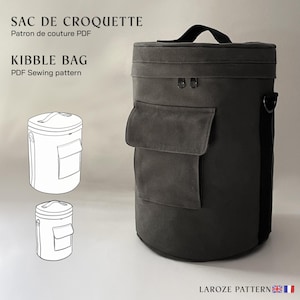 Può includere: Una borsa in tela grigia con una grande tasca frontale e un manico nero. La borsa è etichettata "Kibble Bag" e "Modello di cucito PDF".