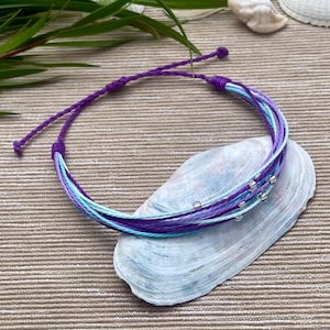 Armband in Lila und Blau Tönen mit Silber gezeichnete Perlen-Freundschaft Armband-Handmade Gewachste Schnur geflochtene Surf Armband-Made in Wales
