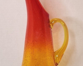 Vintage Kanawha Amberina Crackle Glass Stretch Swung Pitcher gloeit onder UV