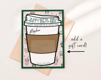 May include: A green card with a coffee cup design. The text on the card reads "Happy Birthday! I hope your day is a latte fun!" with a space for a name and a gift card. The card has a pink background with a pattern of coffee cups.