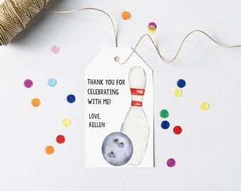 May include: White thank you tag with a red and white bowling pin and a blue bowling ball. The tag says "Thank you for celebrating with me! Love, Kellen".