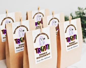 May include: Brown paper bags with a ghost and spider design and the text "You make class a real treat! Happy Halloween! From, Mrs. McGowan" printed on them.