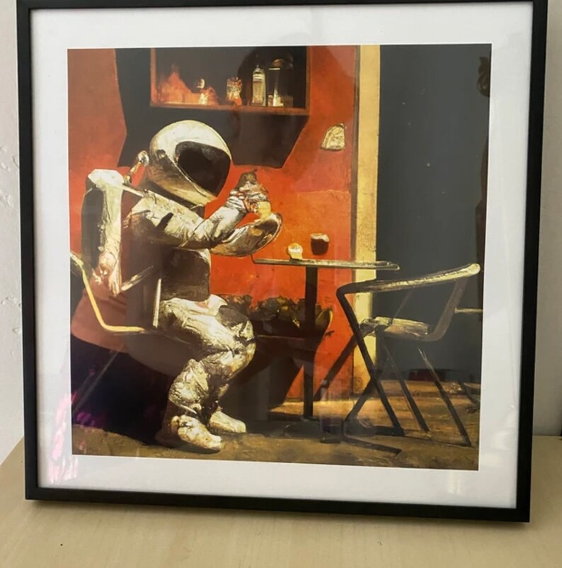 May include: A painting of an astronaut sitting at a table in a cafe, wearing a white spacesuit and holding a cup. The cafe is painted in warm colors with a red wall and a dark green plant in the background.