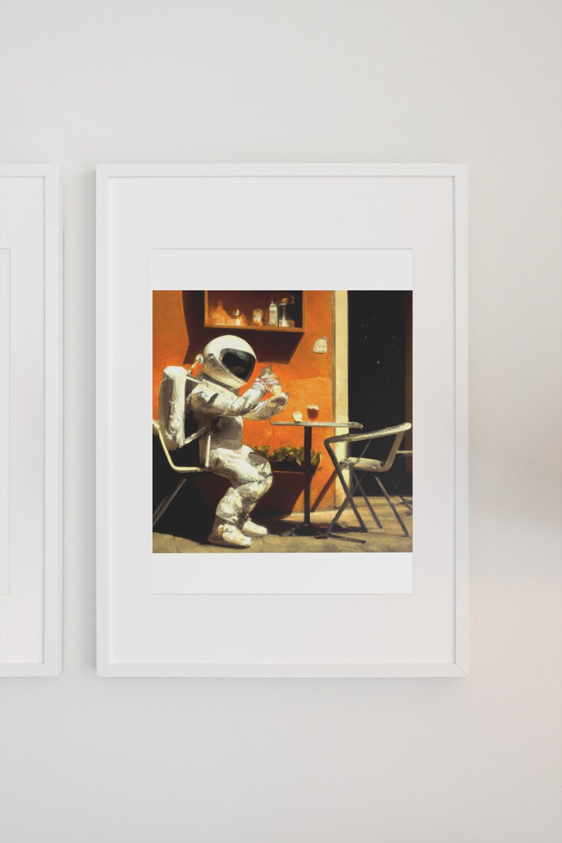May include: An astronaut wearing a white spacesuit sits at a table outside a cafe, holding a glass of liquid. The cafe has an orange wall and a black door.
