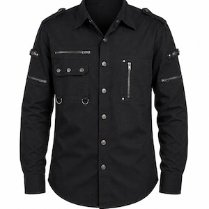 May include: A black long-sleeve button-down shirt featuring multiple utility-style pockets, silver-toned metal zippers, and decorative D-rings. The shirt includes shoulder epaulets, a standard collar, and circular metal buttons down the front placket.