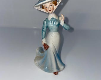 Porcelain Lady Figurine with Mary Poppins-style Hat