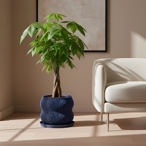 May include: A set of three ceramic mugs with a speckled, matte finish in cream, light brown, and dark brown. The mugs have a minimalist design, ideal for tea or coffee.