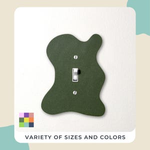 May include: A rustic wooden sign with the text "Welcome to our home" in white lettering. The sign features a distressed finish and a simple, inviting design, perfect for entryway decor.