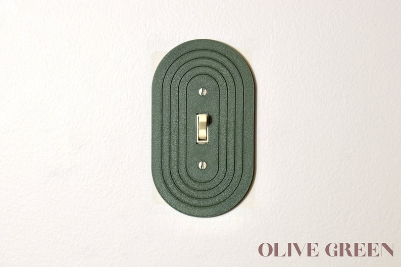 Sleek Minimalist Oval Light Switch Cover Plate image 1