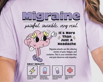 May include: A light purple t-shirt with the word "Migraine" in a purple and black font. The shirt has a cartoon brain graphic and text that reads "It's More Than Just A Headache."