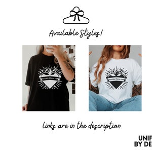 May include: Two t-shirts featuring a black and white graphic of a heart with flames and the text "Unbreakable Fitness Club". The t-shirts are available in black and white.