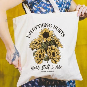 Bolsa de lona «Todo duele» Bolsa de tela «Y aún así me levanto» Bolsa de tela con girasoles Bolsa de tela «Sobreviviente del brote» Regalo para guerreros del síndrome de dolor crónico