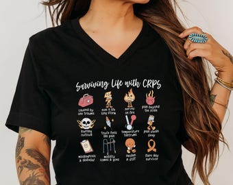 CRPS Awareness shirt met v-hals - Surviving Life met CRPS damesshirt, T-shirt complex regionaal pijnsyndroom, CRPS Warrior, chronische pijn laait op