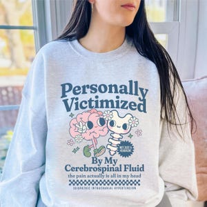 Personally Victimized by My Cerebrospinal Fluid IIH Sweatshirt Idiopathic Intracranial Hypertension Awareness Sweater Gift for Spoonie Shirt