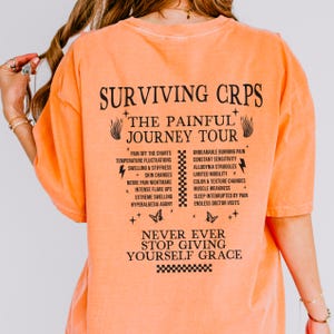 Überleben CRPS Die schmerzhafte Reise Tour Shirt komplexes regionales Schmerzsyndrom Orange Bewusstsein Tshirt Chronische Nervenschmerzen Geschenk für Spoonie