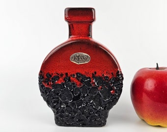 A West German Fat Lava vase made by Jopeko. The vase is red with black lava.