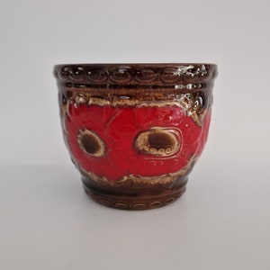 A West German Fat Lava flowerpot by Scheurich. The flowerpot is numbered: 887-17.