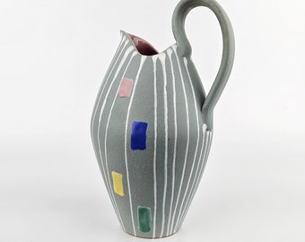 A West German Fat Lava vase / pitcher by Gebruder Conradt. The vase / jug is numbered: 100/4. Decor Oslo.
