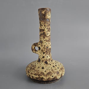 A beautiful vintage vase made by &quot;Vest Keramiek&quot; / &quot;van Woerden&quot;, Gouda, Holland. Beige lava and model number F4.