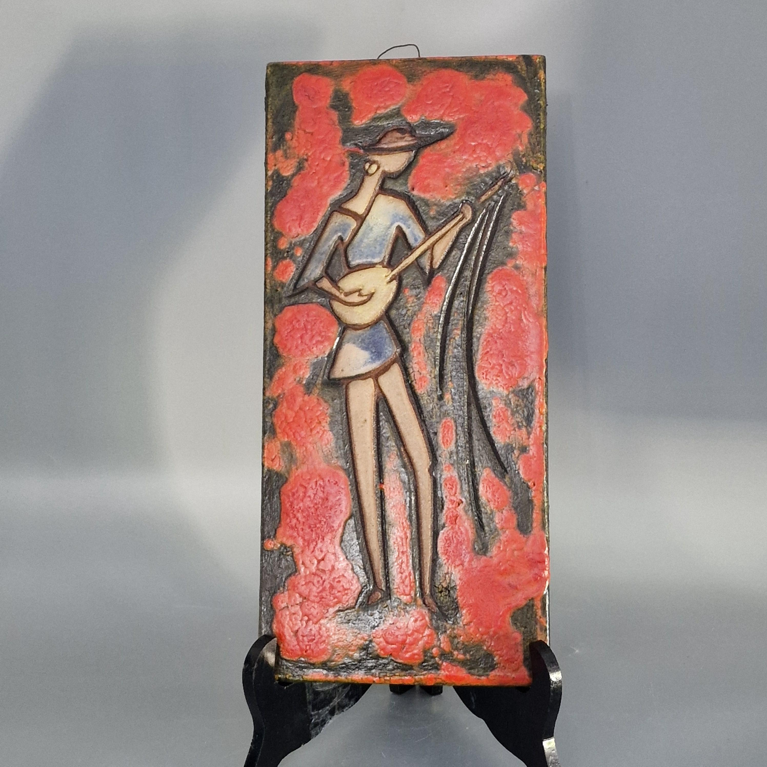 Vintage West German Fat Lava wall plaque. Ruscha. red with the image of a musician. WGP / MCM / 1960. "Dokumenta" series. Adele Bolz