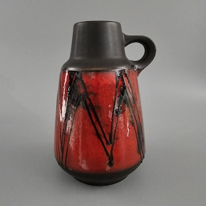 Vintage West German Fat Lava vase made by Carstens Tonnieshof. Shape number 1533-24. Colors: red and black. WGP / MCM / 1960 / 1970.