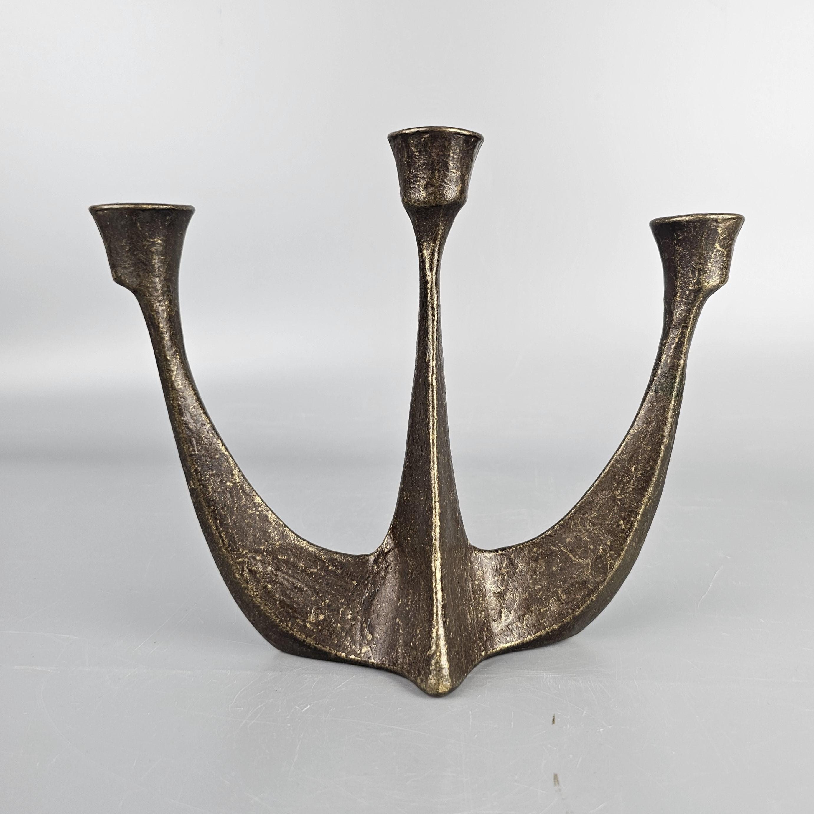 Bronze vintage candlestick for 3 candles. Brutalist design by Horst Dalbeck. Germany 1950 - 1970.