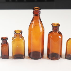 Collection of 6 Brown Antique Dug Consumer Product Bottles From The Early 1900&#39;s