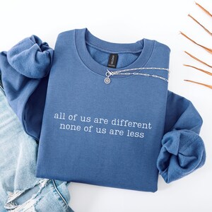 All Of Us Are Different None Of Us Are Less Sweatshirt, Disability Awareness Sweatshirt, Neurodiversity Crewneck